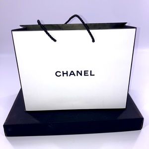 Chanel small white paper shopping bag w/black handles for storage or display